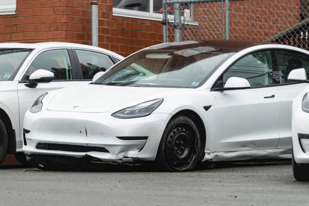 Damaged Tesla Model 3 stock photo