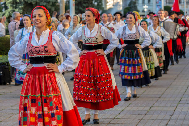 Dancers from Portugal in traditional costume Timisoara: Dancers from Portugal in traditional costume present at the international folk festival INTERNATIONAL FESTIVAL OF HEARTS organized by the City Hall Timisoara. portuguese culture stock pictures, royalty-free photos & images