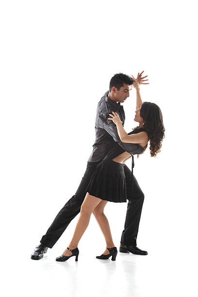 dancing teen couple - salsa dancing stok fotoğraflar ve resimler
