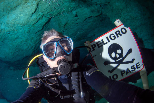 danger no trespassing sign in Cave diving in mexican cenotes stock photo