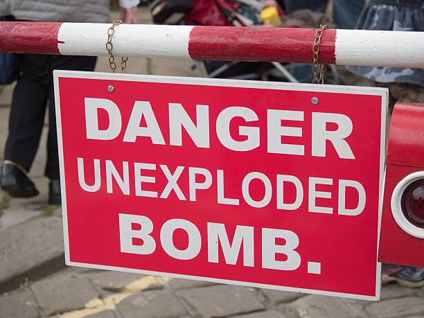 Danger Unexploded bomb replica World War II scene. stock photo