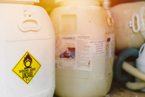 Dangerous chemical Oxidizing agent UN2468 Trichloroisocyanuric acid or Chlorine tank for pool disinfectant. stock photo