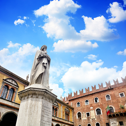 Statue of Dante Alighieri in Verona, Italy. The work of Ugo Zannoni was completed in 1865. Composite photo