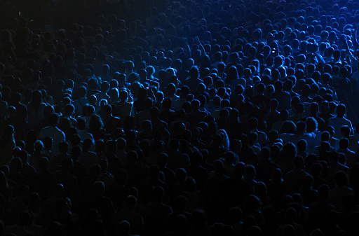 Dark background of crowd at concert