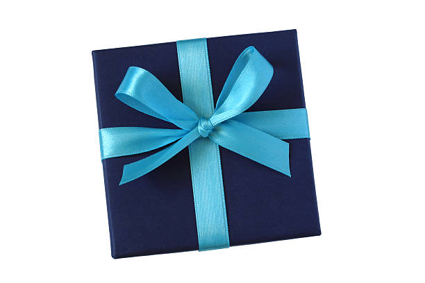 Dark blue gift box with ribbon bow stock photo