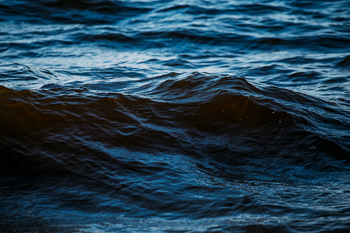 Dark blue waves in the water