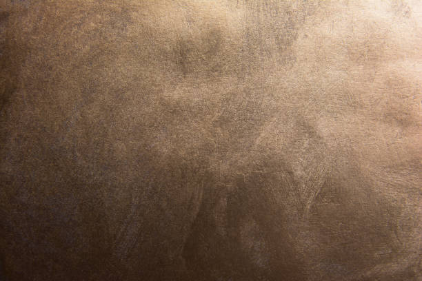 fondo de textura de bronce degradado oscuro - copper texture fotografías e imágenes de stock