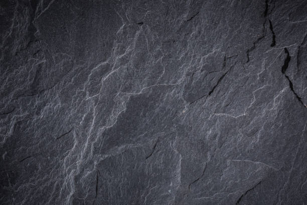 Dark grey and black slate background or texture Dark gray slate texture, abstract background stone material stock pictures, royalty-free photos & images
