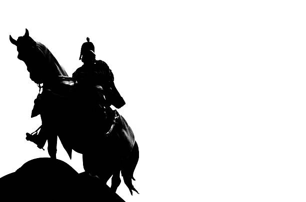 Photo of dark night with his horse looking down