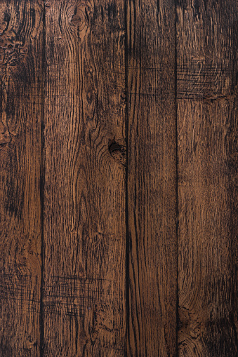 dark wood background texture with weathered rustic look in barn