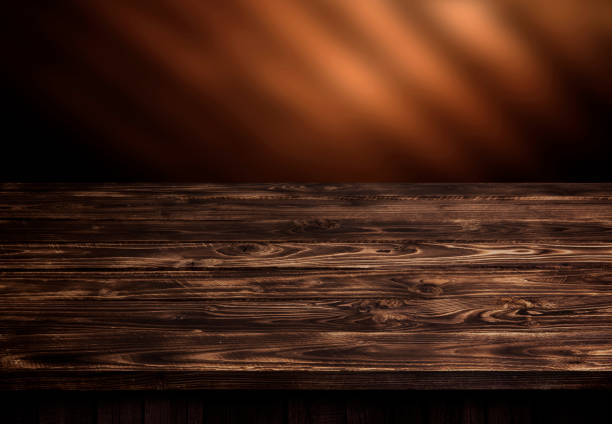 Dark wood table, brown wooden perspective interior Dark wood table, brown wooden perspective interior, for product display brown background stock pictures, royalty-free photos & images