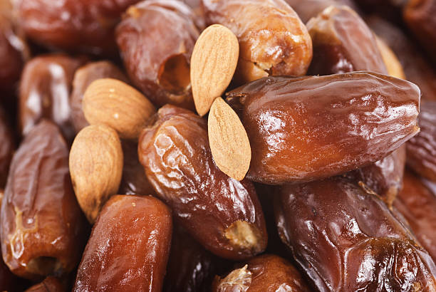 Dates and almonds stock photo