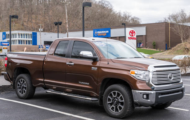 A dealership in Monroeville, Pennsylvania, USA with a Toyota Tundra pick up truck for sale stock photo