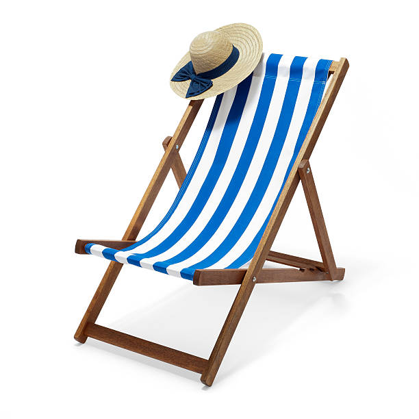 Deck Chair and Hat stock photo