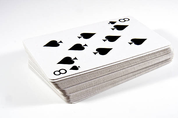 Deck of cards isolated on white - shuffled stock photo