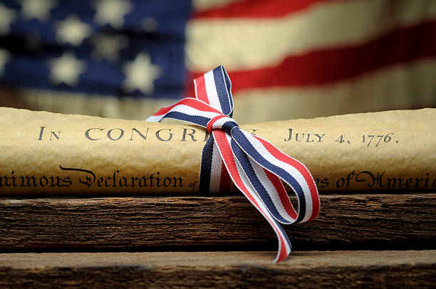 Declaration Of Independence and Ribbon Copy of the United States Declaration Of Independence - Stock Photo 1776 american flag stock pictures, royalty-free photos & images