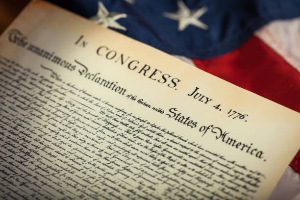 Declaration of independence. Old American Documents on American Flag declaration of independence stock pictures, royalty-free photos & images
