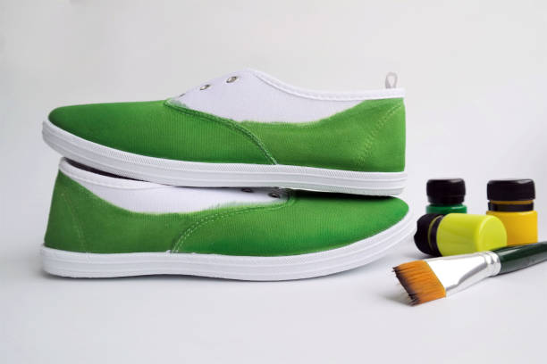 decorate sneakers with acrylic paint DIY stock photo