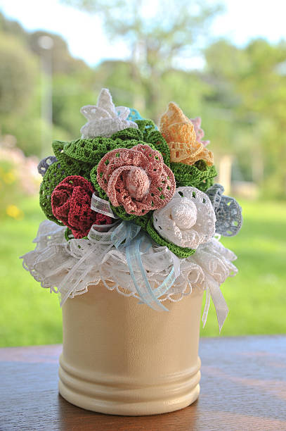 decoration of flowers made by hand crochet stock photo
