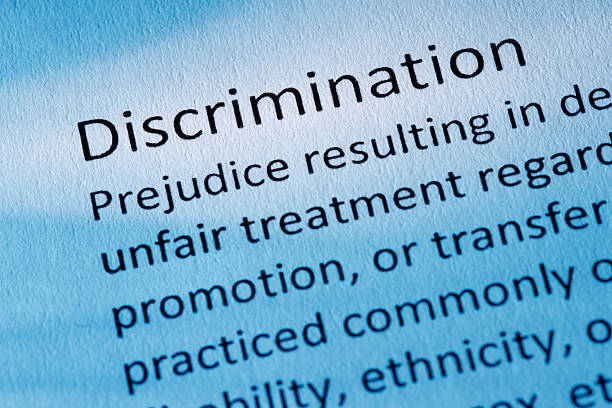 Definition: Discrimination The Discrimination highlighted in a blue toned image. racism stock pictures, royalty-free photos & images