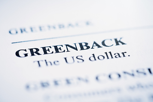 In a list of business and financial terms, 'Greenback'' is defined.