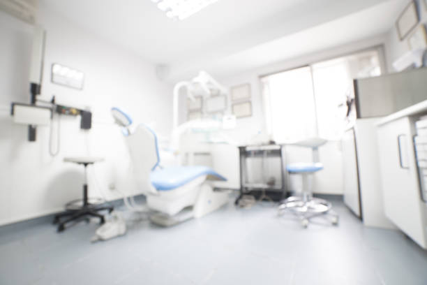 Defocused dental hygiene clinic Defocused dental hygiene clinic. Dental office background medical clinic stock pictures, royalty-free photos & images