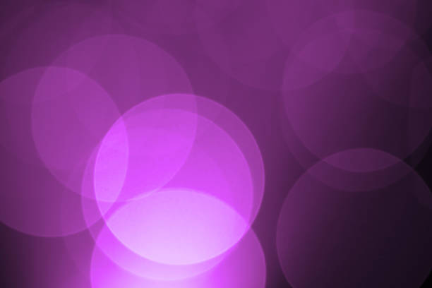 Defocused purple holiday light background stock photo