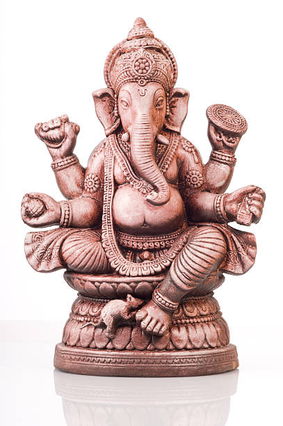 Deity of Ganesha from India on white background stock photo