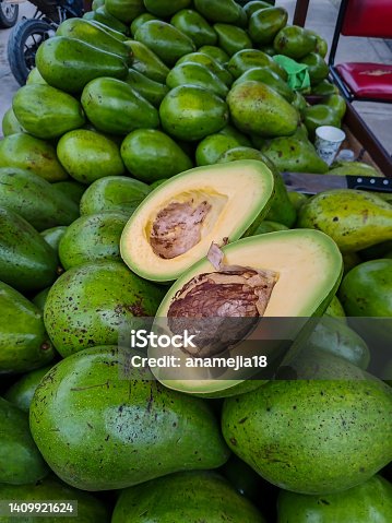istock Delicious avocados been sold at farmers market at the small town of La Calera in Colombia 1409921624