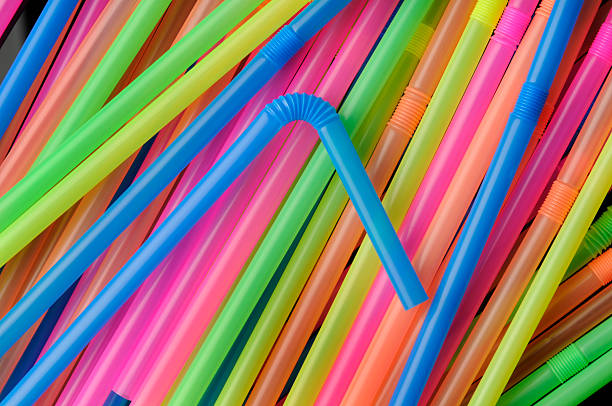 Delicious Colorful Plastic Drinking Straws; Bendable, Flexible, Disposable, Rainbow Colors stock photo