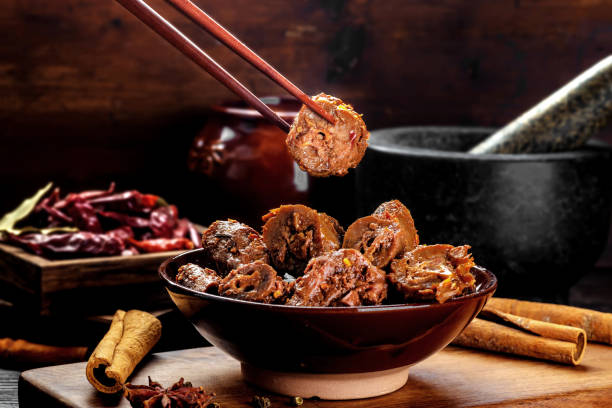 Delicious spicy duck neck in bowl stock photo