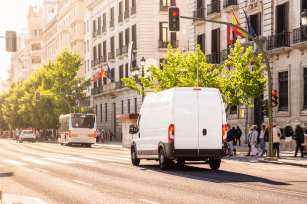 Delivery van in a city stock photo