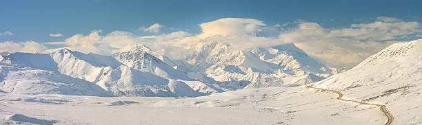 Denali Mountain Panorama in Winter With Road stock photo