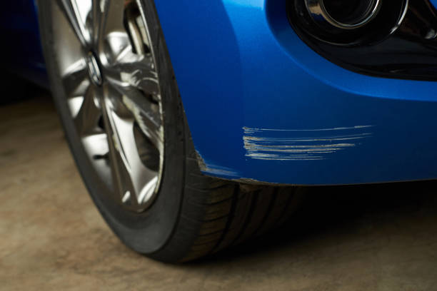Dent car scratch Dent car scratch close-up. Crashed car in accident animal body stock pictures, royalty-free photos & images