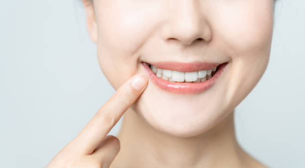 dental care-konzept. - menschlicher zahn stock-fotos und bilder