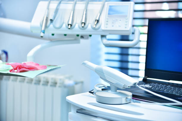 Dental intraoral scanner on table in dentist office. stock photo