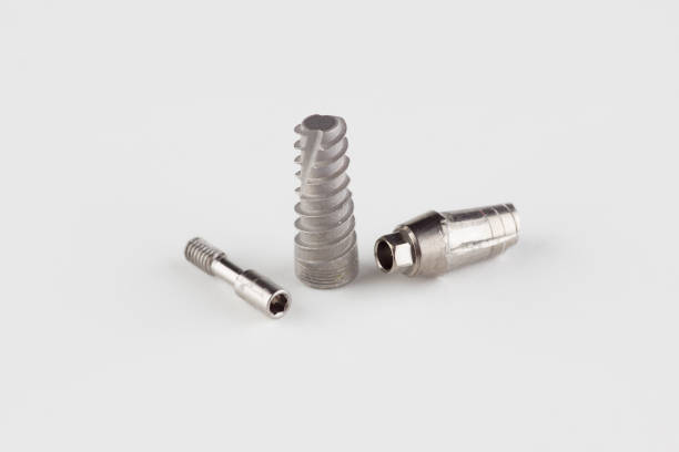 dental titanium implant with locking elements stock photo