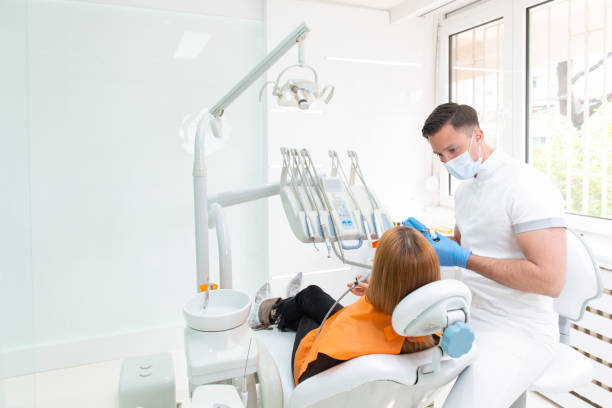 Dentist with patient stock photo