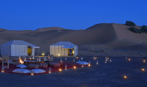 Desert camp at night stock photo