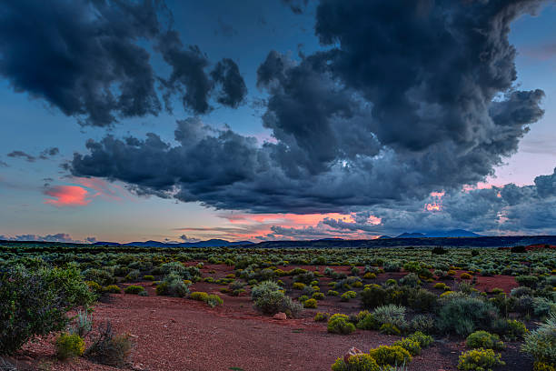 Desert vista at sunset near Flagstaff Arizona Desert vista at sunset near Flagstaff Arizona with the San Francisco Peaks in the distant background. flagstaff arizona stock pictures, royalty-free photos & images