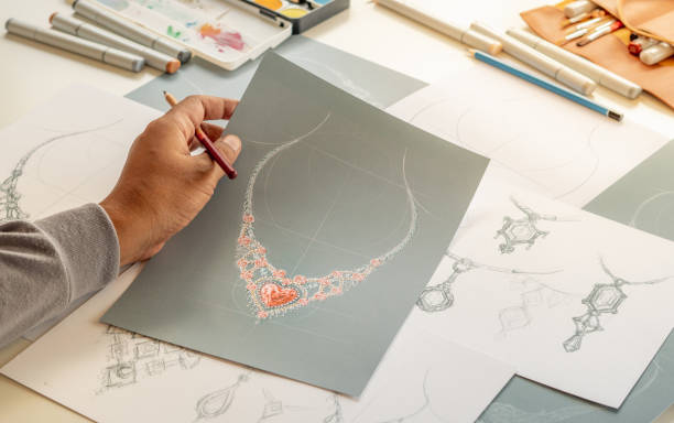 Designer design diamond jewelry drawing sketchesÂ making worksÂ craft unique handmade luxury necklaces product ideas. stock photo