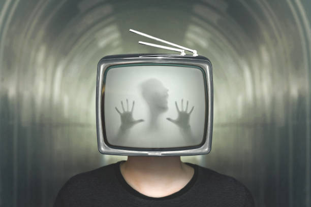 desperate man trapped in a television surreal concept stock photo