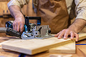 istock detail of biscuit jointer at work 1314028701