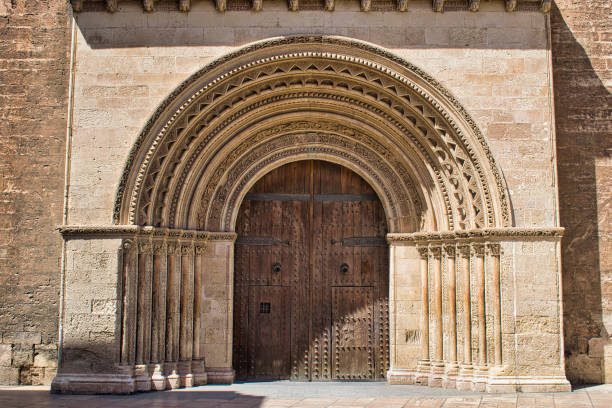 Detail of door of Almoina in the cathedral of Valencia Detail of the door of the Almoina in the cathedral of Valencia romanesque stock pictures, royalty-free photos & images