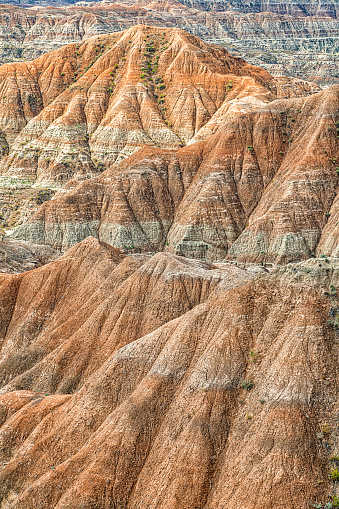 Full frame view of the formations left by wind and rain of the Badlands located at Badlands National Park, South Dakota.