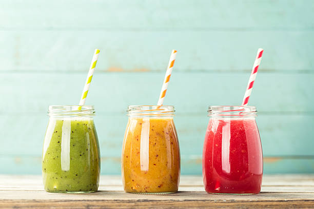 detox smoothie drinks detox smoothie drinks smoothie stock pictures, royalty-free photos & images
