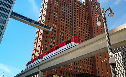 Detroit, Michigan, USA - September 1, 2008: Detroit People Mover train between the Guardian Building and One Woodward in downtown Detroit, Michigan, USA