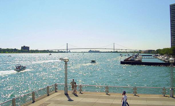 Detroit, Windsor and the Ambassador Bridge in summer stock photo