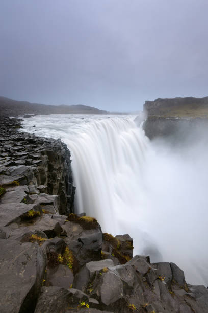 Dettifoss is a waterfall in Iceland. Amazing landscape Dettifoss is a waterfall in Vatnajokull National Park in Iceland, and is the most powerful waterfall in Europe. Amazing landscape at sunrise. iceland dettifoss stock pictures, royalty-free photos & images