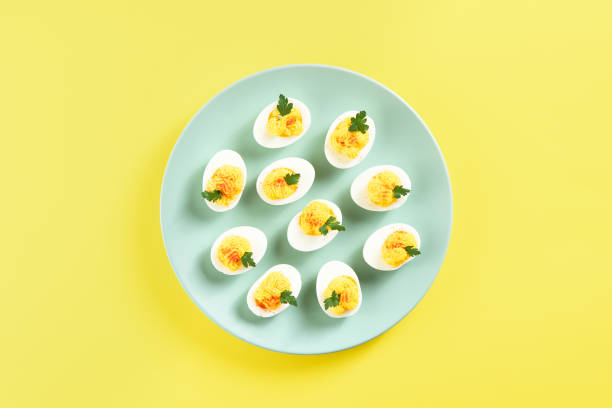 Deviled eggs with paprika stock photo